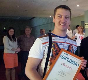 Diploma and the prize to Alexandr Shushunov – the winner of the 8th Club Bowling Tournament