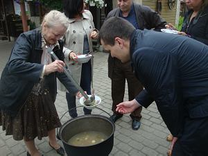 Fish soup, cooked over a fire