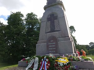  Laying flowers at Lusavsala in Riga